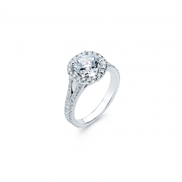 Halo style diamond engagement ring in white gold