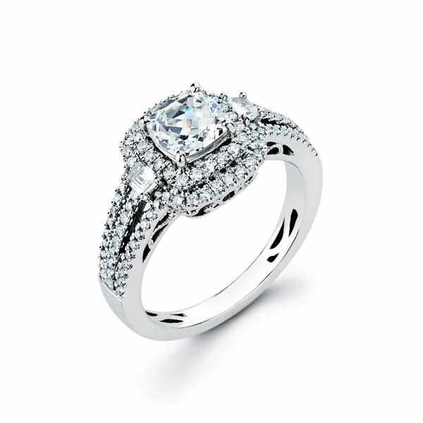 Halo style diamond engagement ring in white gold