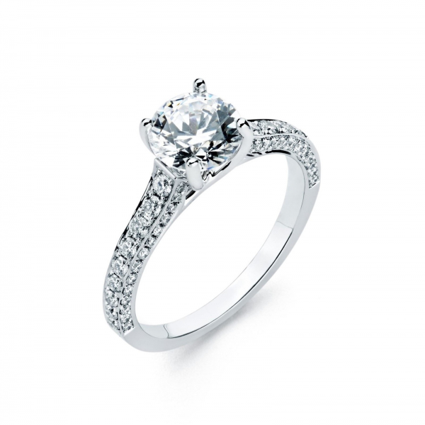 Solitaire four prong diamond engagement ring in white gold