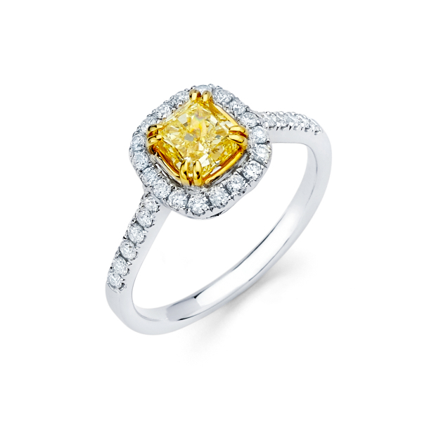 Halo style engagement ring with fancy yellow diamond