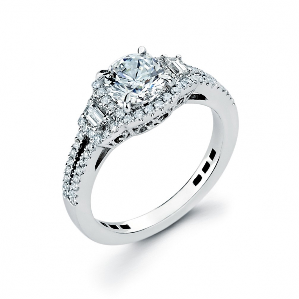 Halo style diamond engagement ring in white gold