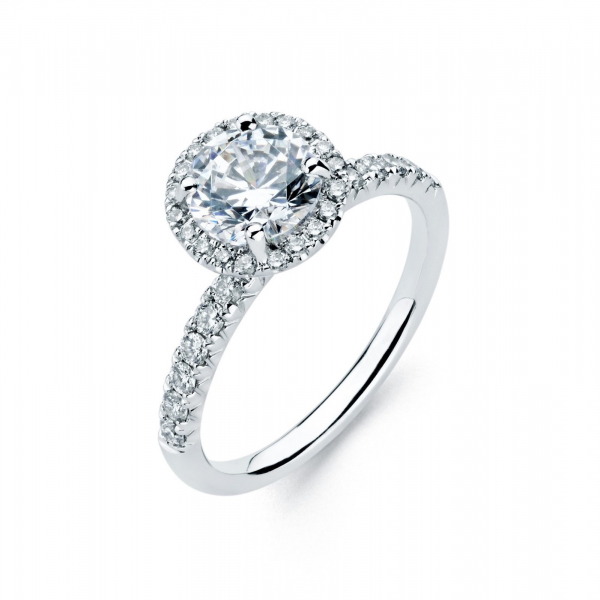 Halo style diamond engagement ring in white gold